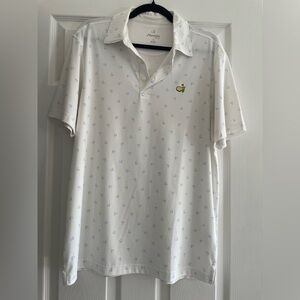 Masters Tech Classic White Golf Polo. Patterned with small blue Master’s logos.